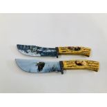 TWO DECORATIVE STAINLESS KNIVES ONE DEPICTING EAGLE THE OTHER WINTER WOLF SCENE (COLLECTION ONLY,