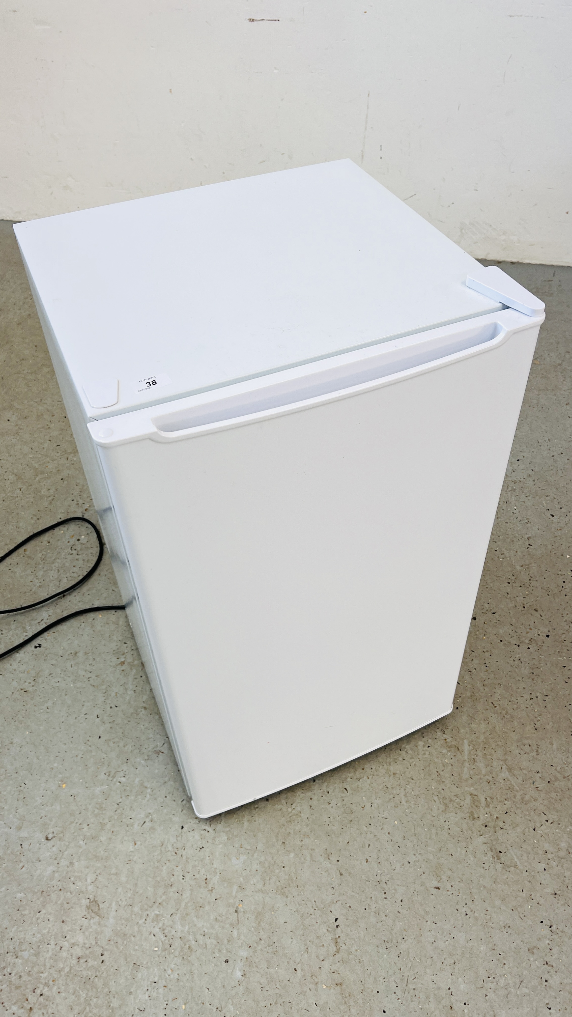 AN UNBRANDED UNDERCOUNTER THREE DRAWER FREEZER - SOLD AS SEEN.