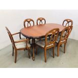 A GOOD QUALITY REPRODUCTION EXTENDING CHERRY WOOD FINISH DINING TABLE COMPLETE WITH A SET OF SIX