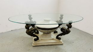 AN IMPRESSIVE CONTINENTAL STYLE GLASS TOP COFFEE TABLE SUPPORTED BY FOUR BUSTS OF WOMEN ON CLAW