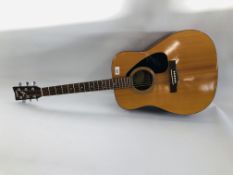 A YAMAHA ACOUSTIC F310 GUITAR.