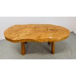 AN ELM WOOD CRAFTS STYLE SLAB WOOD COFFEE TABLE LENGTH 110CM. WIDTH 56CM.