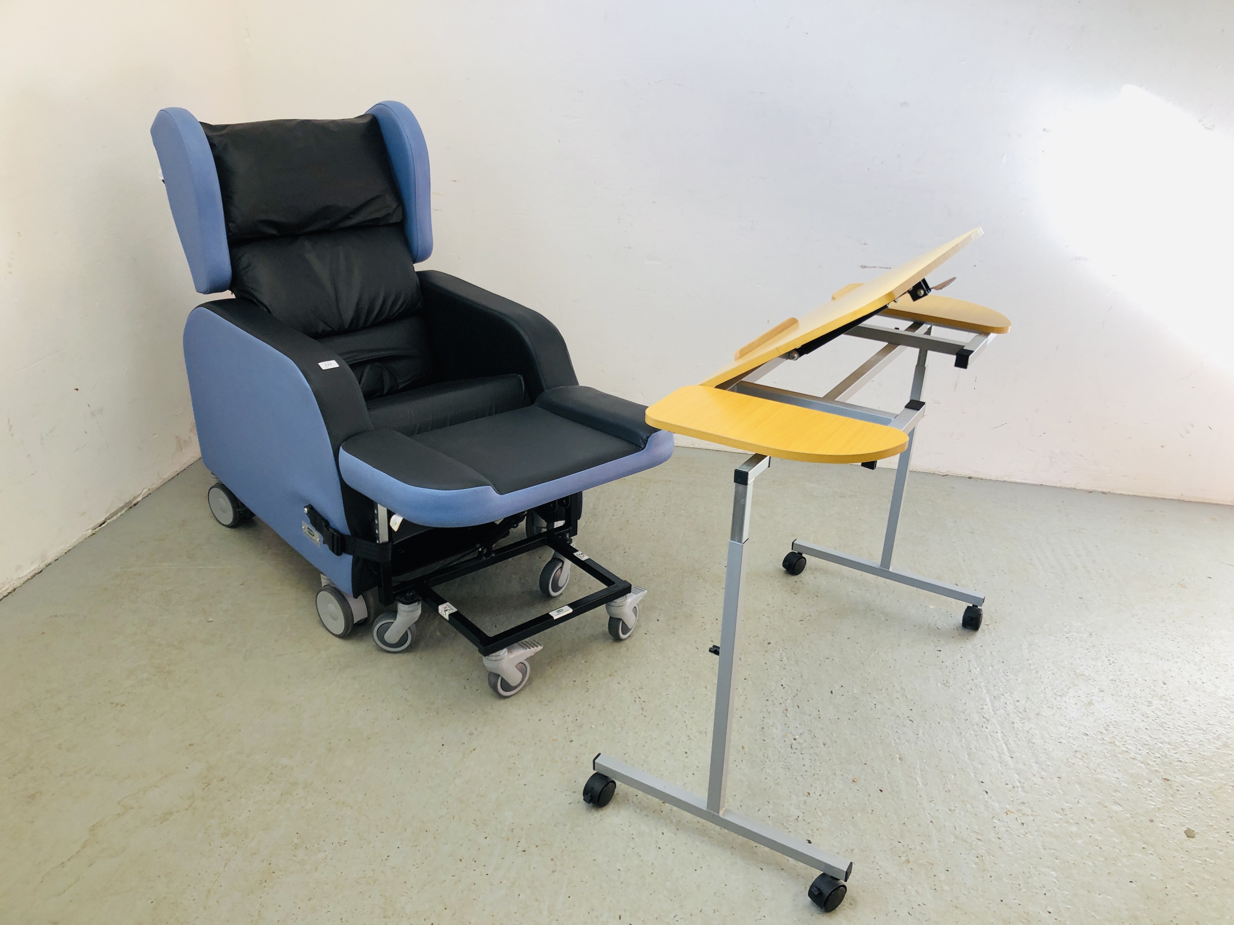 A "SEATING MATTRESS" RECLINING MOBILITY EASY CHAIR AND MATCHING FOOTSTOOL AND ADJUSTABLE BED/CHAIR