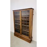 A MAHOGANY BOOKCASE WITH ADJUSTABLE SHELVES AND LEADED GLASS DOORS, W 111CM, D 25CM, H 152CM.