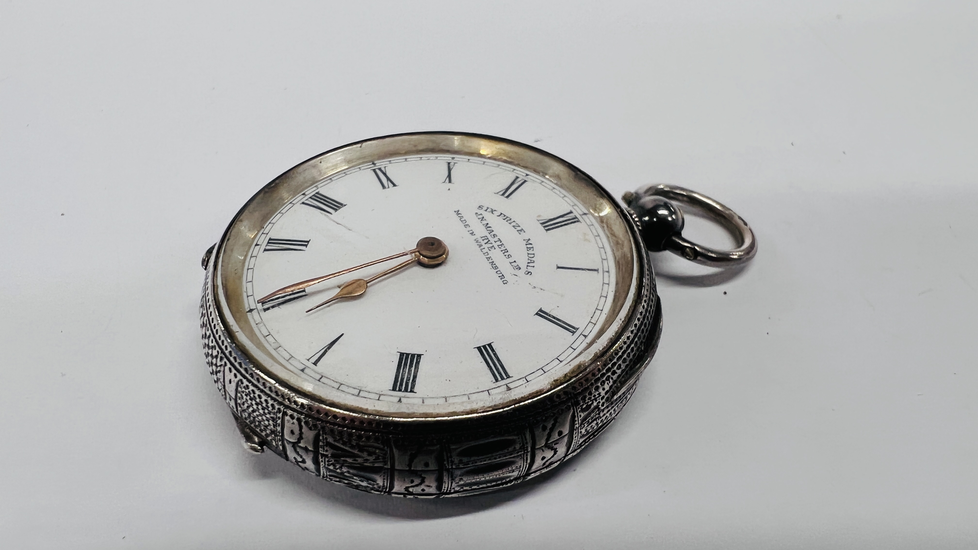 A CONTINENTAL SILVER LADY'S FOB WATCH, KEY WIND WITH WHITE ENAMEL DIAL, RETAILED BY MASTERS LTD, - Image 6 of 12