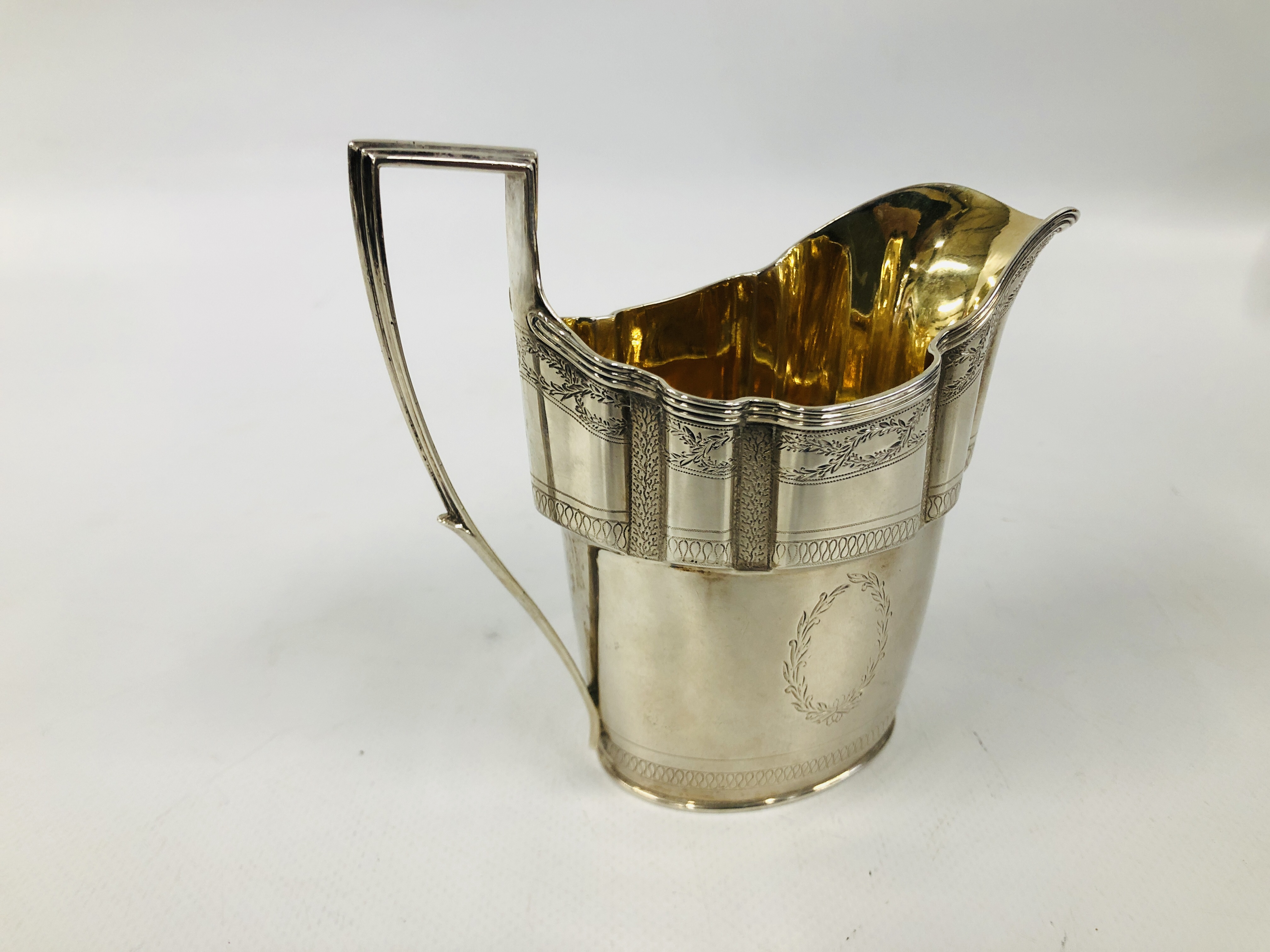 GEORGE III SILVER HELMET SHAPED MILK JUG THE BODY WITH LAUREL LEAVES, - Image 5 of 10