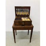 A MAHOGANY CANTEEN OF SILVER PLATED CUTLERY (NOT COMPLETE) ON MAHOGANY STAND