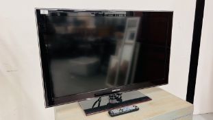 SAMSUNG 40 INCH TELEVISION COMPLETE WITH REMOTE - SOLD AS SEEN
