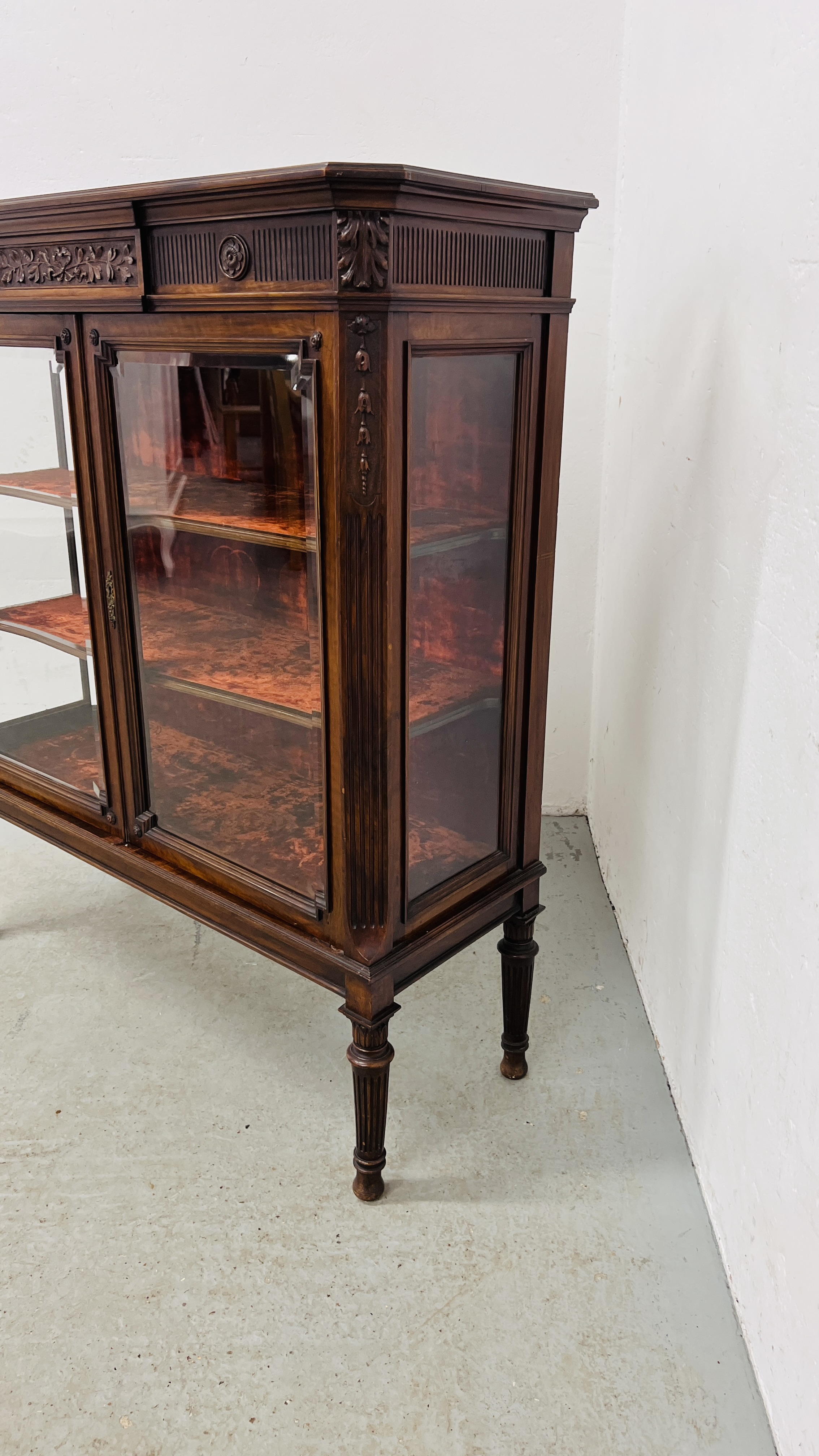 ANTIQUE MAHOGANY TWO DOOR GLAZED DISPLAY CABINET WITH VELVET UPHOLSTERED SHELVES STANDING ON REEDED - Image 4 of 14