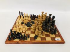 GROUP OF ASSORTED CHESS PIECES TO INCLUDE VINTAGE EXAMPLES ALONG WITH A CHESS BOARD.