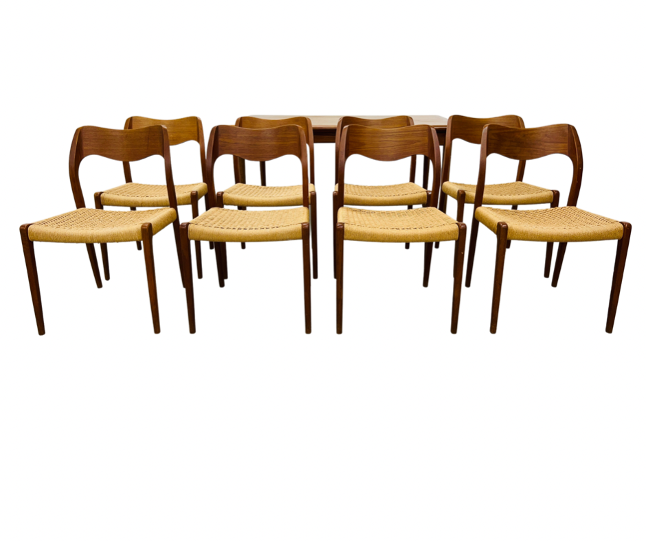 SET OF EIGHT J MOLLER DANISH TEAK DINING CHAIRS WITH WOVEN SISAL SEATS ALONG WITH A DRAWER LEAF