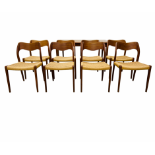 SET OF EIGHT J MOLLER DANISH TEAK DINING CHAIRS WITH WOVEN SISAL SEATS ALONG WITH A DRAWER LEAF