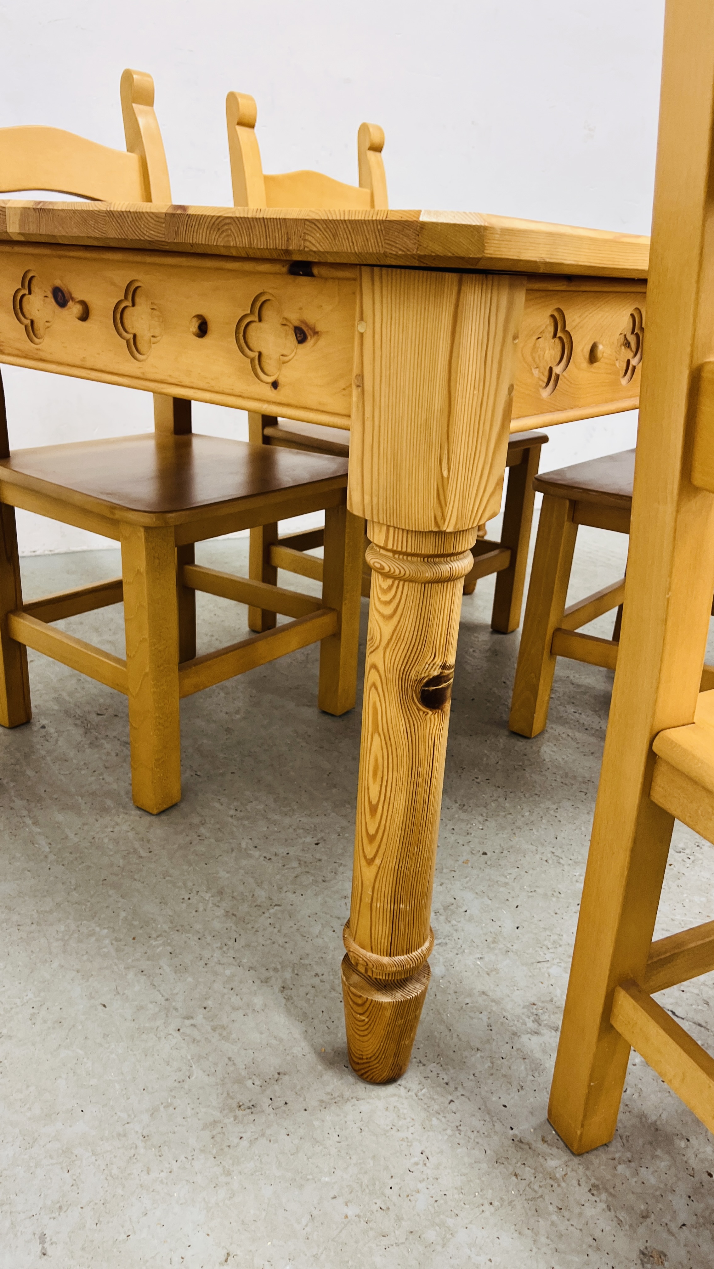 A SOLID NATURAL PINE RECTANGULAR DINING TABLE WITH CARVED DETAIL TO RAILS WIDTH 90CM. LENGTH 153CM. - Image 9 of 14