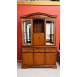 A GOOD QUALITY REPRODUCTION CHERRY WOOD FINISH DISPLAY CABINET ON THREE DRAWER THREE DOOR BASE.