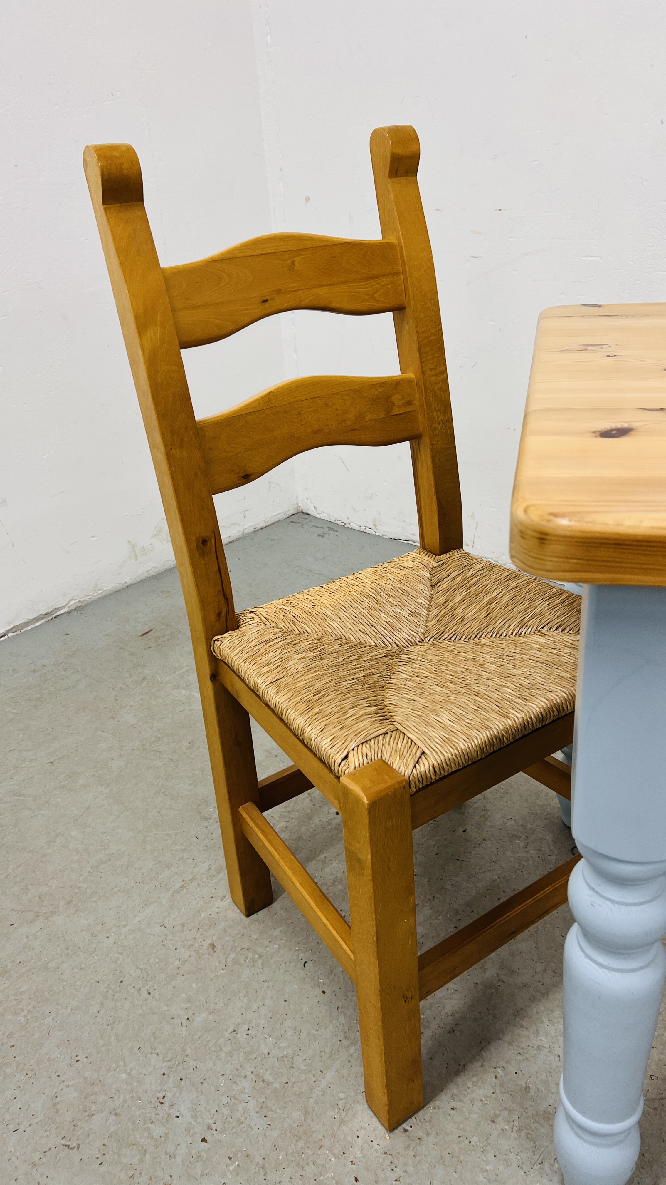 A SOLID PINE BREAKFAST TABLE WITH NATURAL WAXED FINISH TOP AND TWO SOLID BEECHWOOD DINING CHAIRS - Image 6 of 8