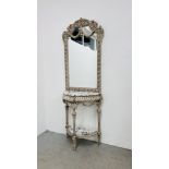 A CONTINENTAL MARBLE TOP HALF MOON SIDE TABLE ON ORNATE CARVED BASE AND SHELF BELOW WITH MIRRORED