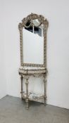 A CONTINENTAL MARBLE TOP HALF MOON SIDE TABLE ON ORNATE CARVED BASE AND SHELF BELOW WITH MIRRORED