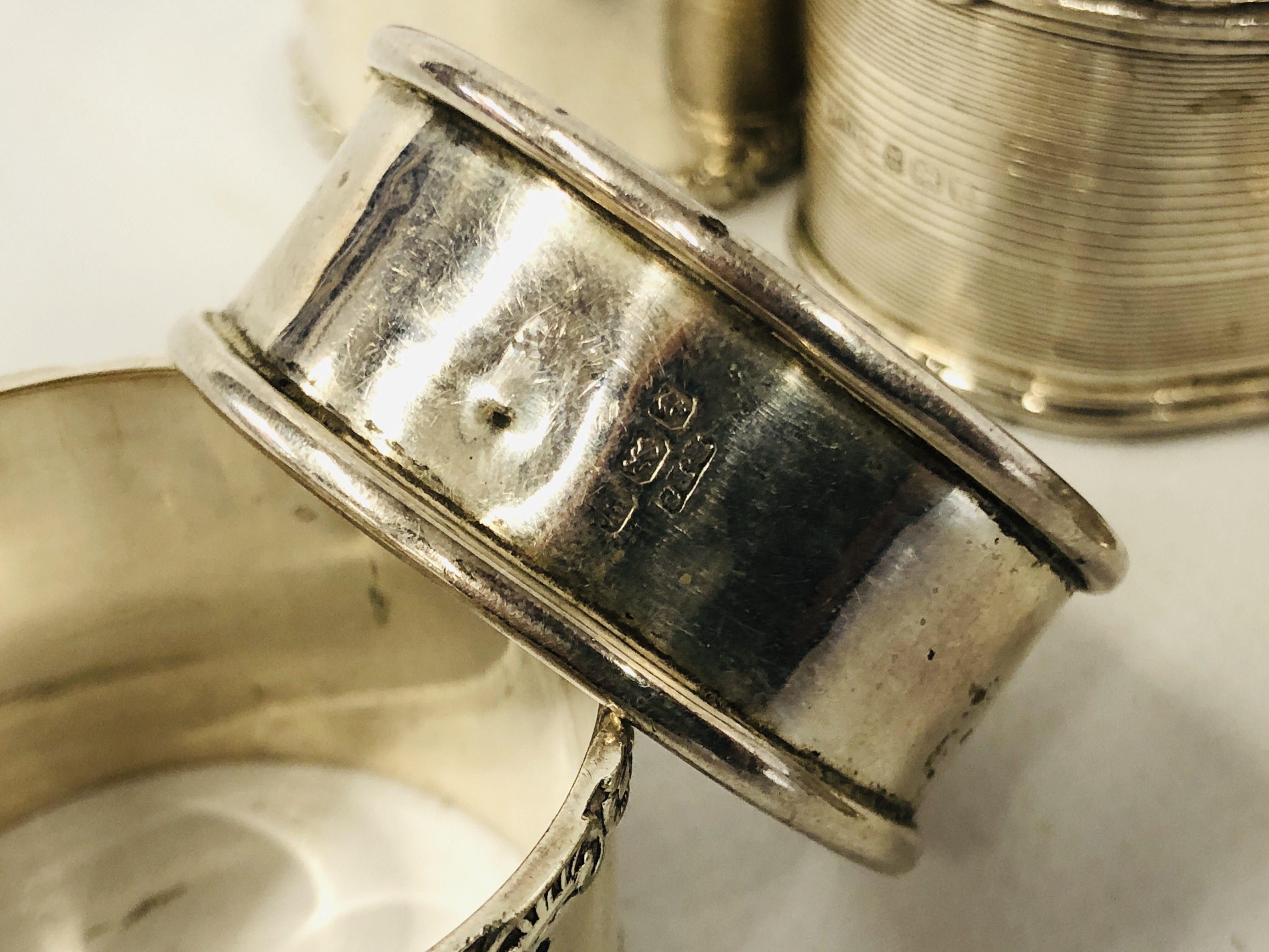 A GROUP OF FOUR SILVER NAPKIN RINGS ALONG WITH FOUR OTHERS UNMARKED - Image 8 of 9