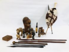BOX OF ETHNIC HARDWOOD CARVINGS, VARIOUS SPEARS AND AN ANIMAL SKIN SHIELD ETC.