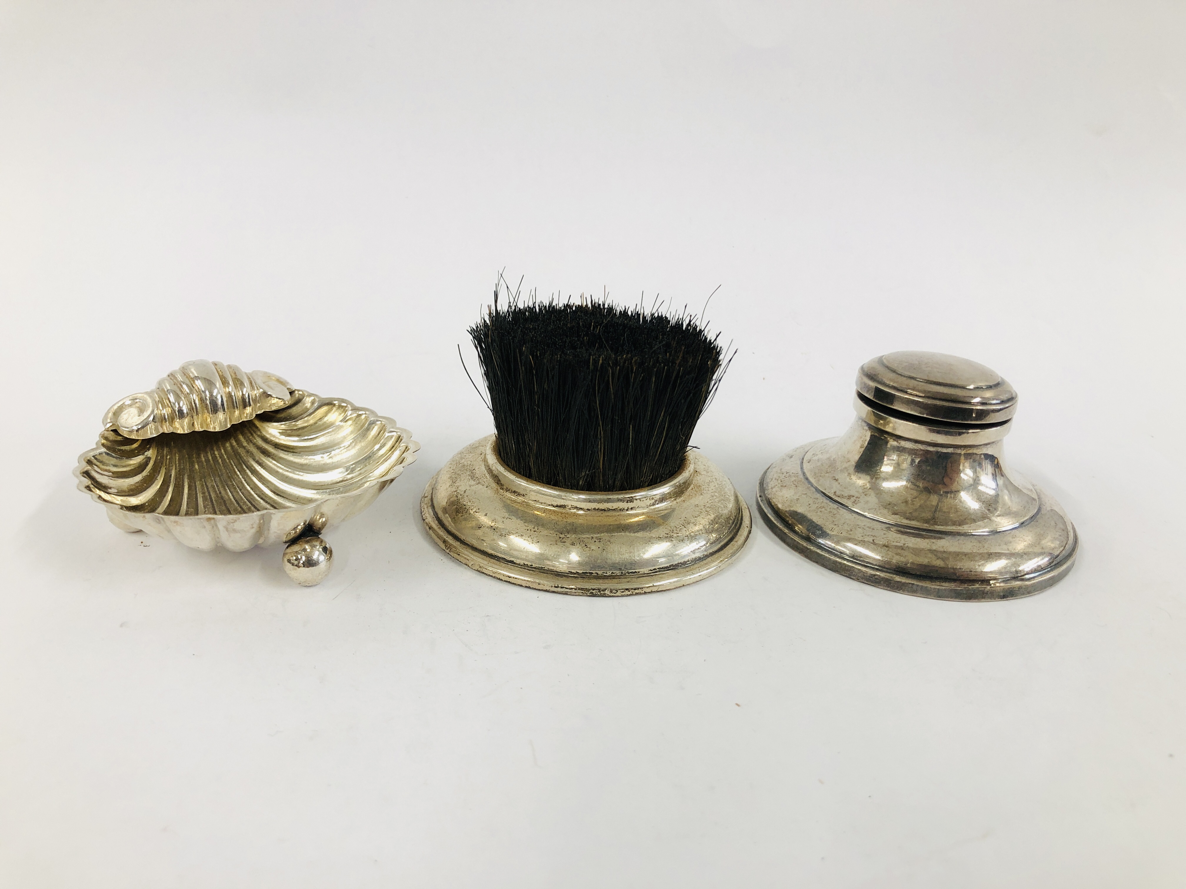 SILVER MOUNTED CIRCULAR BRUSH, BIRMINGHAM 1902 ALONG WITH A SILVER INKWELL AND SILVER SHELL SALT,