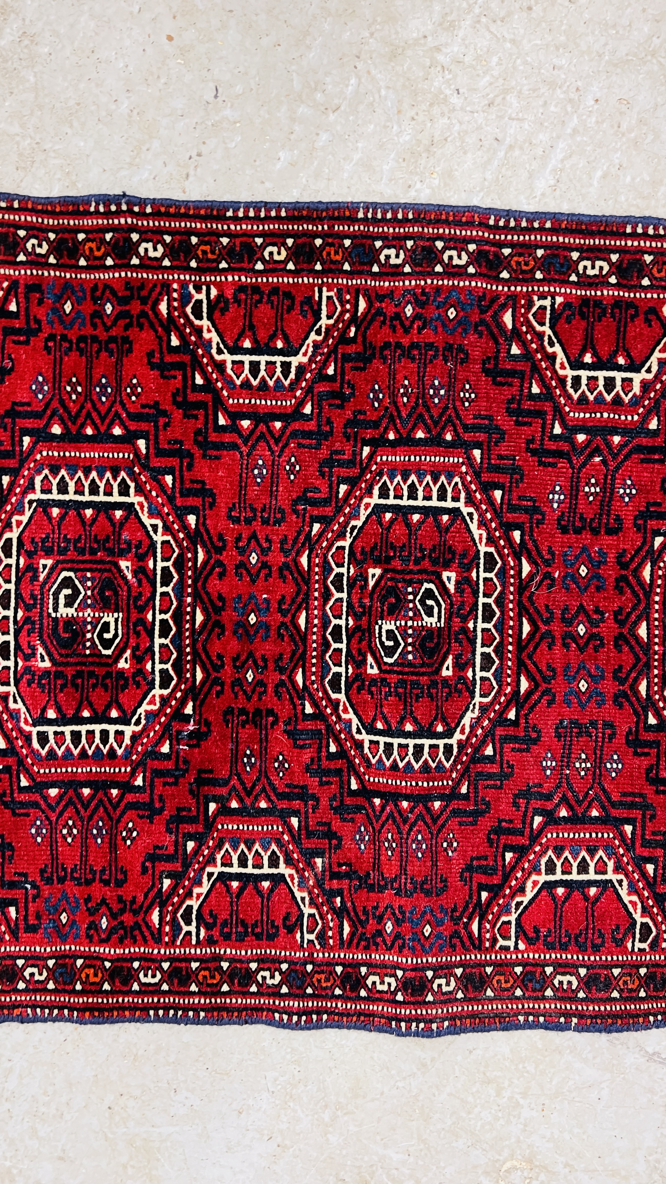 AZTEC DESIGN RUG ON RED BACKGROUND 132 X 65CM. - Image 3 of 6