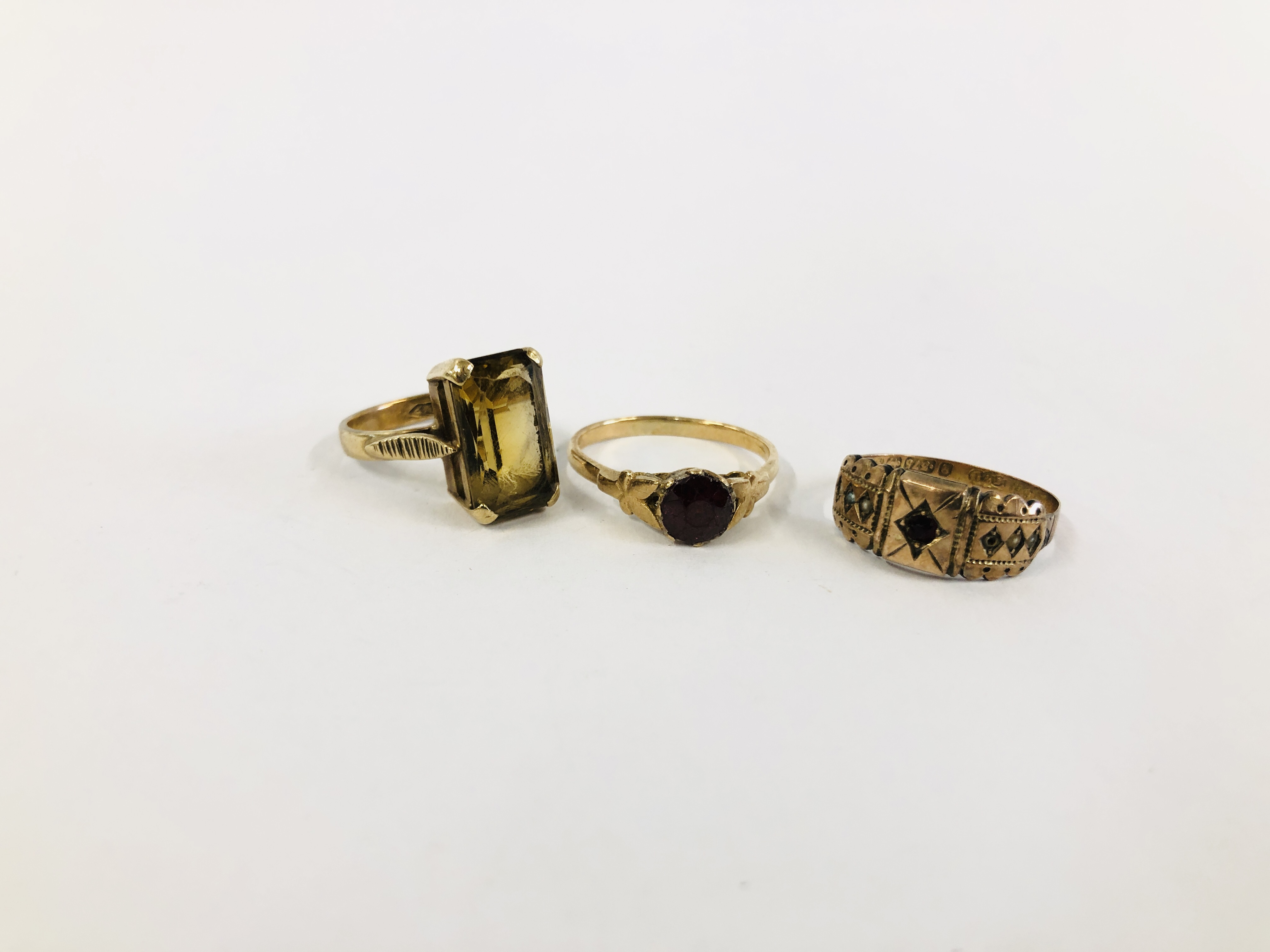 A GROUP OF THREE 9CT GOLD RINGS TO INCLUDE GYPSY STYLE, SINGLE STONE SET RING,