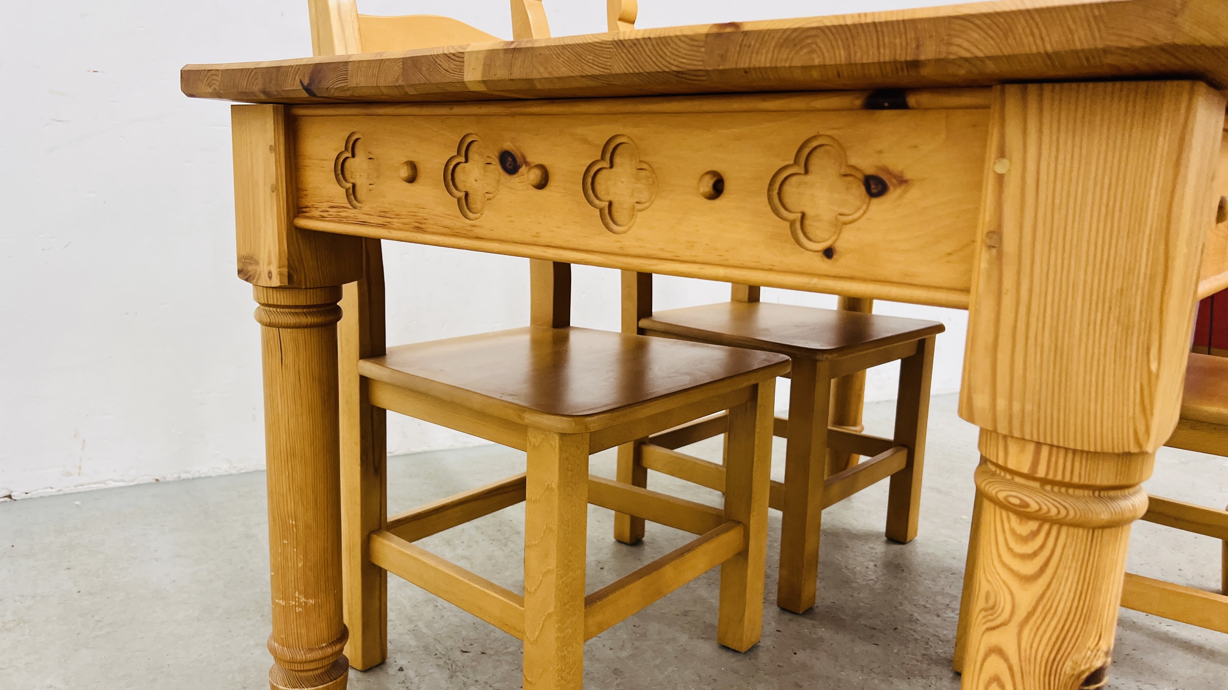 A SOLID NATURAL PINE RECTANGULAR DINING TABLE WITH CARVED DETAIL TO RAILS WIDTH 90CM. LENGTH 153CM. - Image 10 of 14