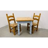 A SOLID PINE BREAKFAST TABLE WITH NATURAL WAXED FINISH TOP AND TWO SOLID BEECHWOOD DINING CHAIRS