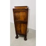 A LATE REGENCY MAHOGANY CUPBOARD WITH CUPBOARDS ABOVE AND BELOW AND IMPRESSIVE CLAW FEET, W 46CM,