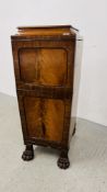A LATE REGENCY MAHOGANY CUPBOARD WITH CUPBOARDS ABOVE AND BELOW AND IMPRESSIVE CLAW FEET, W 46CM,