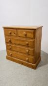 WAXED PINE TWO OVER THREE DRAWER CHEST.