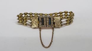 AN EDWARDIAN UNMARKED YELLOW METAL BRACELET, THE RECTANGULAR PANELS SURROUNDED BY SEED PEARLS,