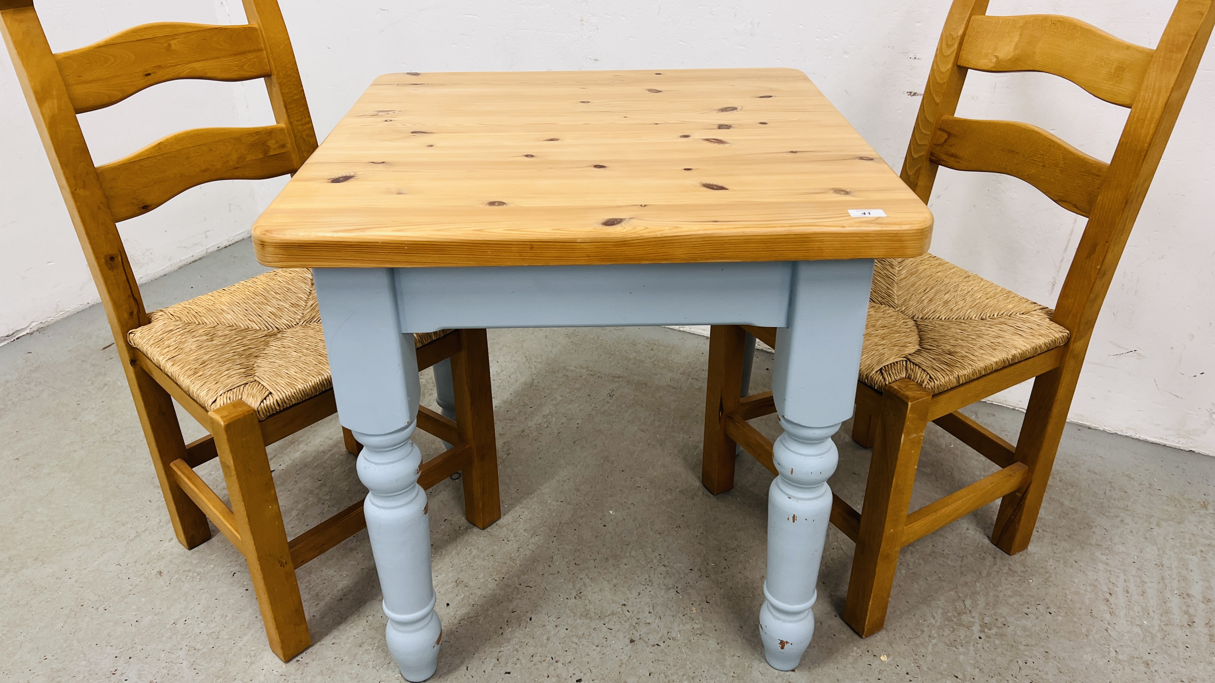 A SOLID PINE BREAKFAST TABLE WITH NATURAL WAXED FINISH TOP AND TWO SOLID BEECHWOOD DINING CHAIRS - Image 2 of 8