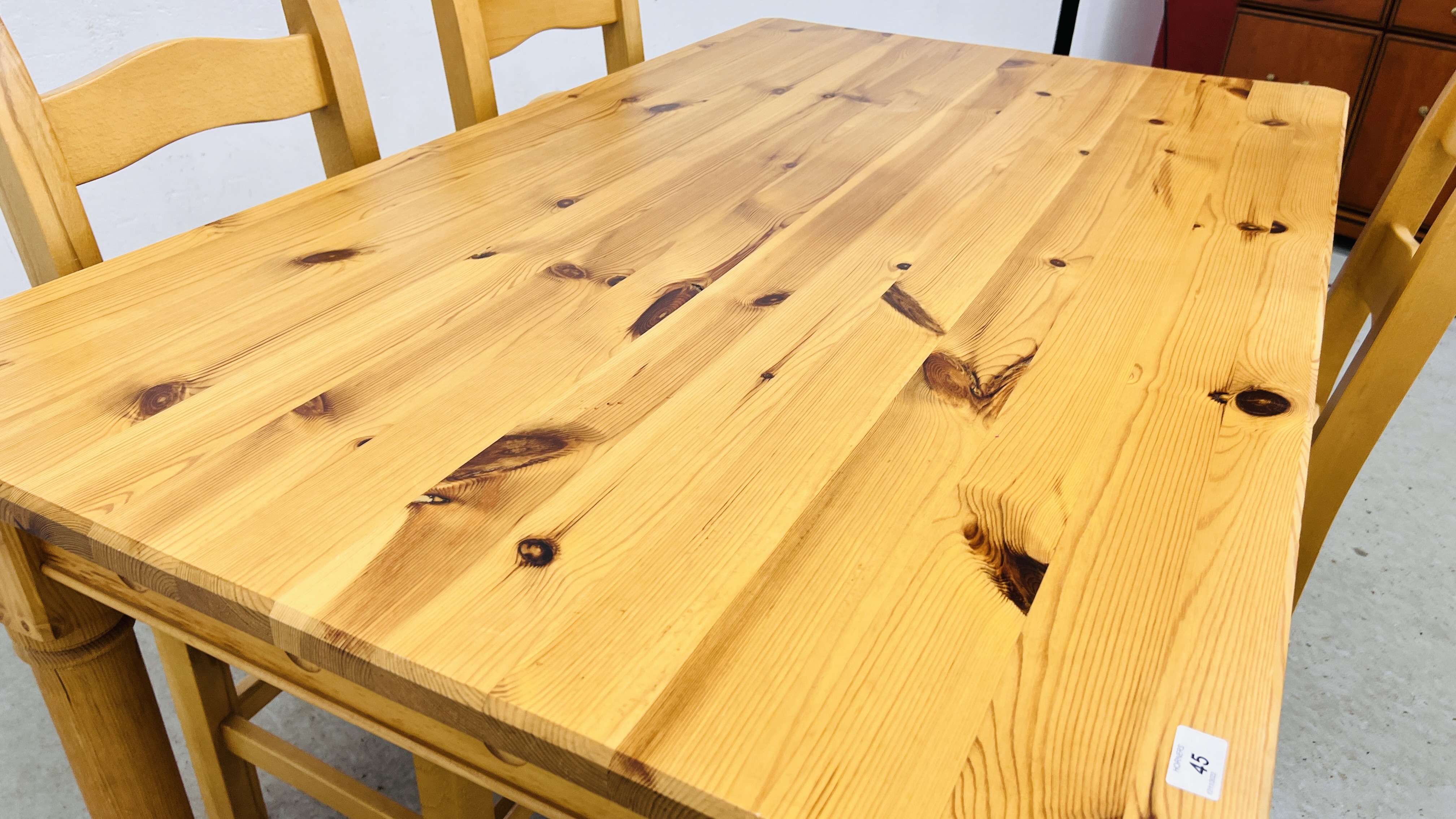 A SOLID NATURAL PINE RECTANGULAR DINING TABLE WITH CARVED DETAIL TO RAILS WIDTH 90CM. LENGTH 153CM. - Image 14 of 14