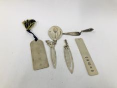 FOUR VARIOUS SILVER BOOKMARKS, TENNIS, BUTTERFLY AND TROWEL ALONG WITH A MILLENNIUM PAGE MARKER,