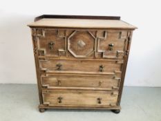 ANTIQUE OAK THREE DRAWER CHEST WITH GEOMETRICAL STYLE DETAILING AND BRASS HANDLES (2 HANDLES LATER)