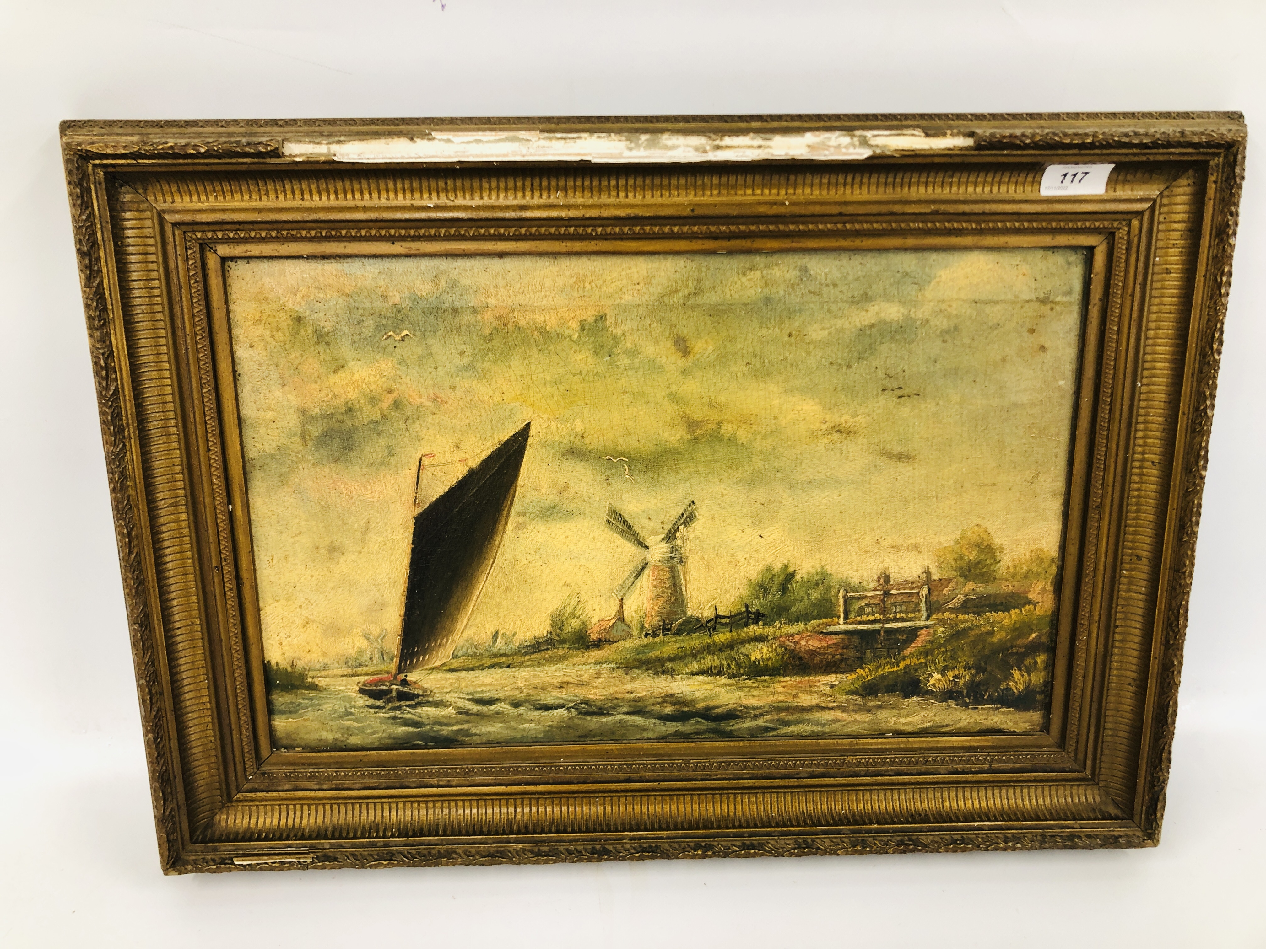 A GILT FRAMED OIL ON CANVAS DEPICTING SAILING BOAT ON THE RIVER PASSING A WINDMILL BEARING