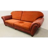 A TETRA EASTWOOD RED LEATHER AND UPHOLSTERED SOFA WITH STUD DETAIL, W 250CM.