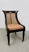 A REGENCY LADIES CHAIR WITH CANED BACK AND SEAT WITH FITTED CUSHION.