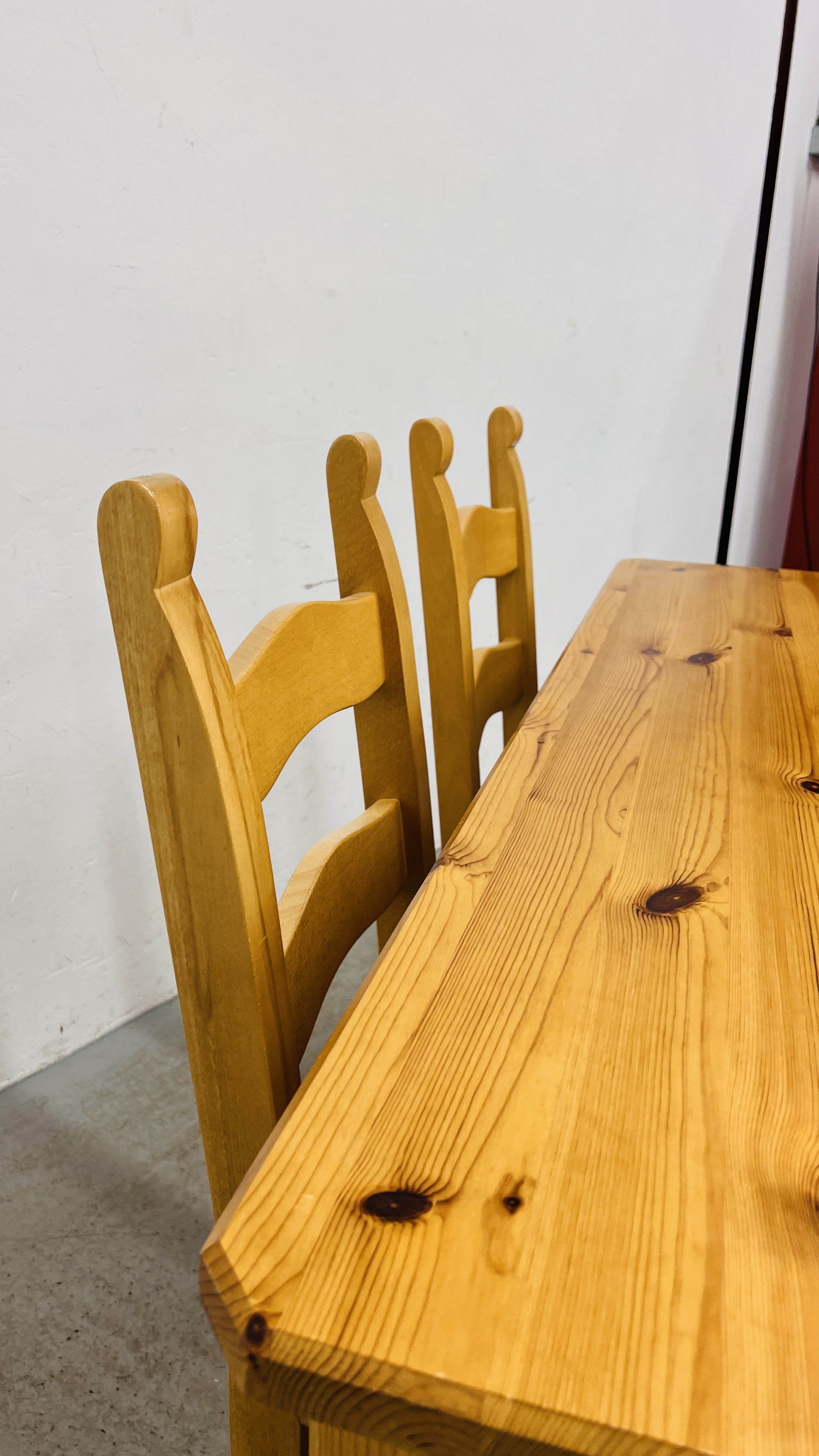 A SOLID NATURAL PINE RECTANGULAR DINING TABLE WITH CARVED DETAIL TO RAILS WIDTH 90CM. LENGTH 153CM. - Image 12 of 14