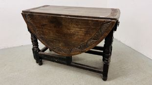 AN OAK GATELEG TABLE, PARTLY C17TH WITH LATER CARVING AND DRAWER TO END, W 104CM, D 134CM, H 72CM.