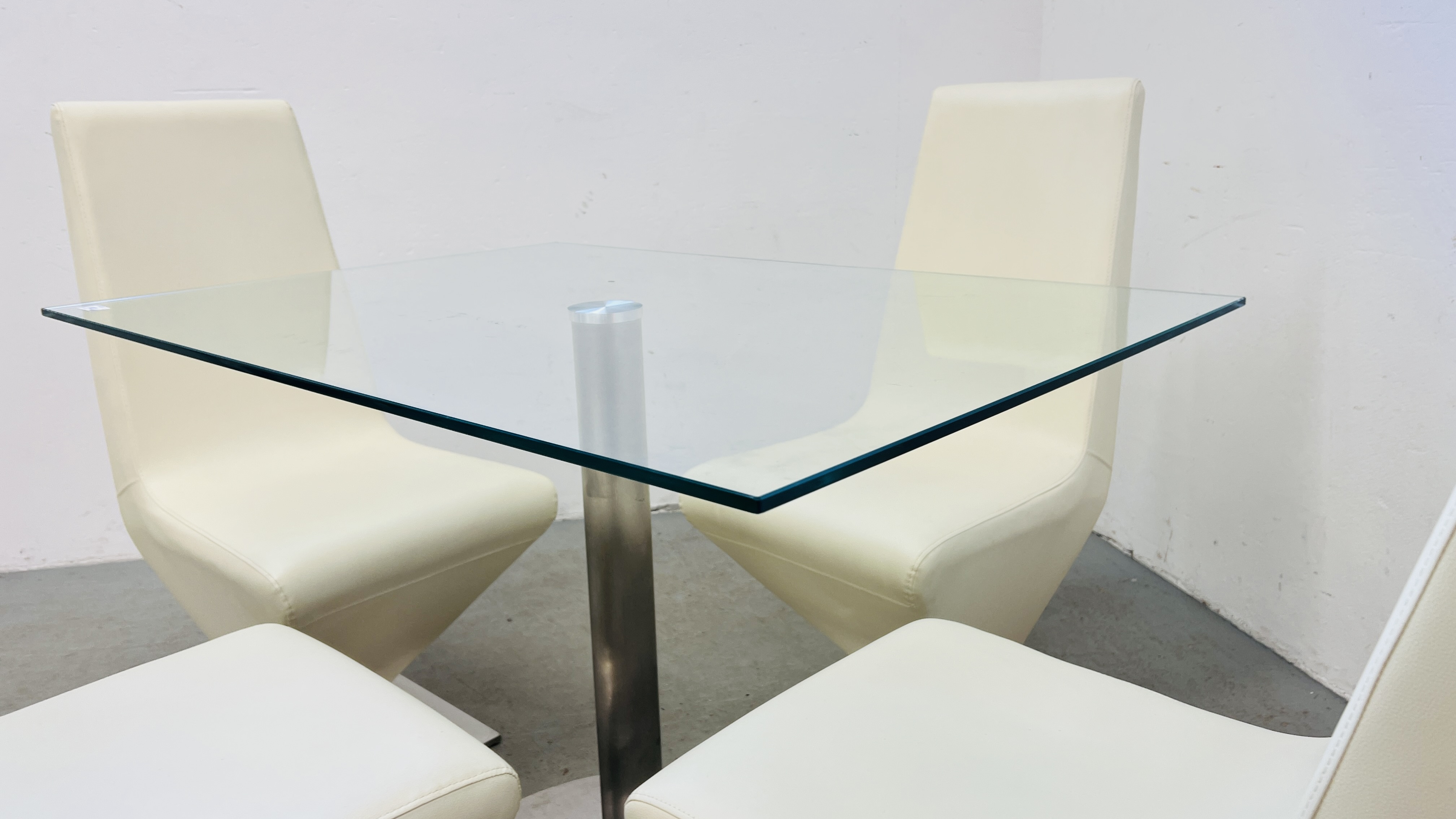 A MODERN DESIGNER GLASS TOP RECTANGULAR DINING TABLE SUPPORTED BY STAINLESS STEEL PEDESTAL COMPLETE - Image 3 of 9