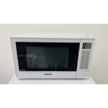 A PANASONIC INVERTER MICROWAVE OVEN WITH INSTRUCTION BOOK - SOLD AS SEEN