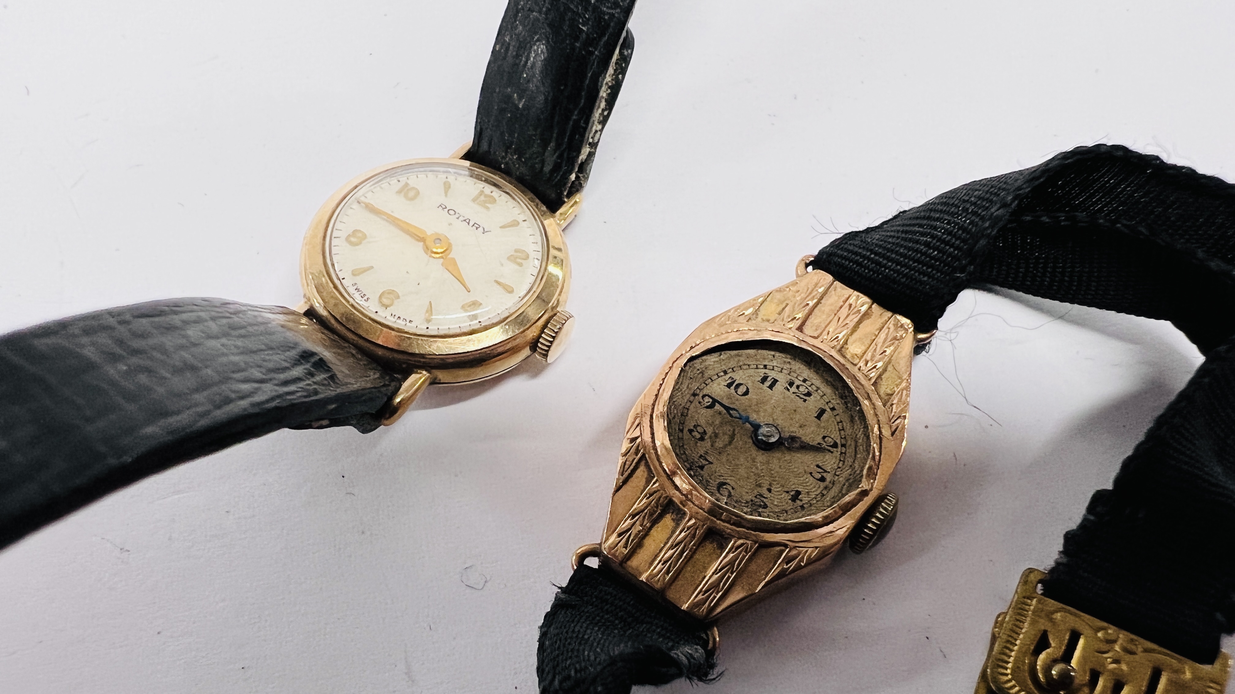 A LADY'S 9CT GOLD ROTARY WATCH WITH LEATHER STRAP AND A LADY'S 9CT GOLD COCKTAIL WATCH (POOR