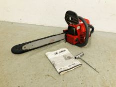 AN EFCO 140 PETROL CHAIN SAW AND MANUAL - SOLD AS SEEN.
