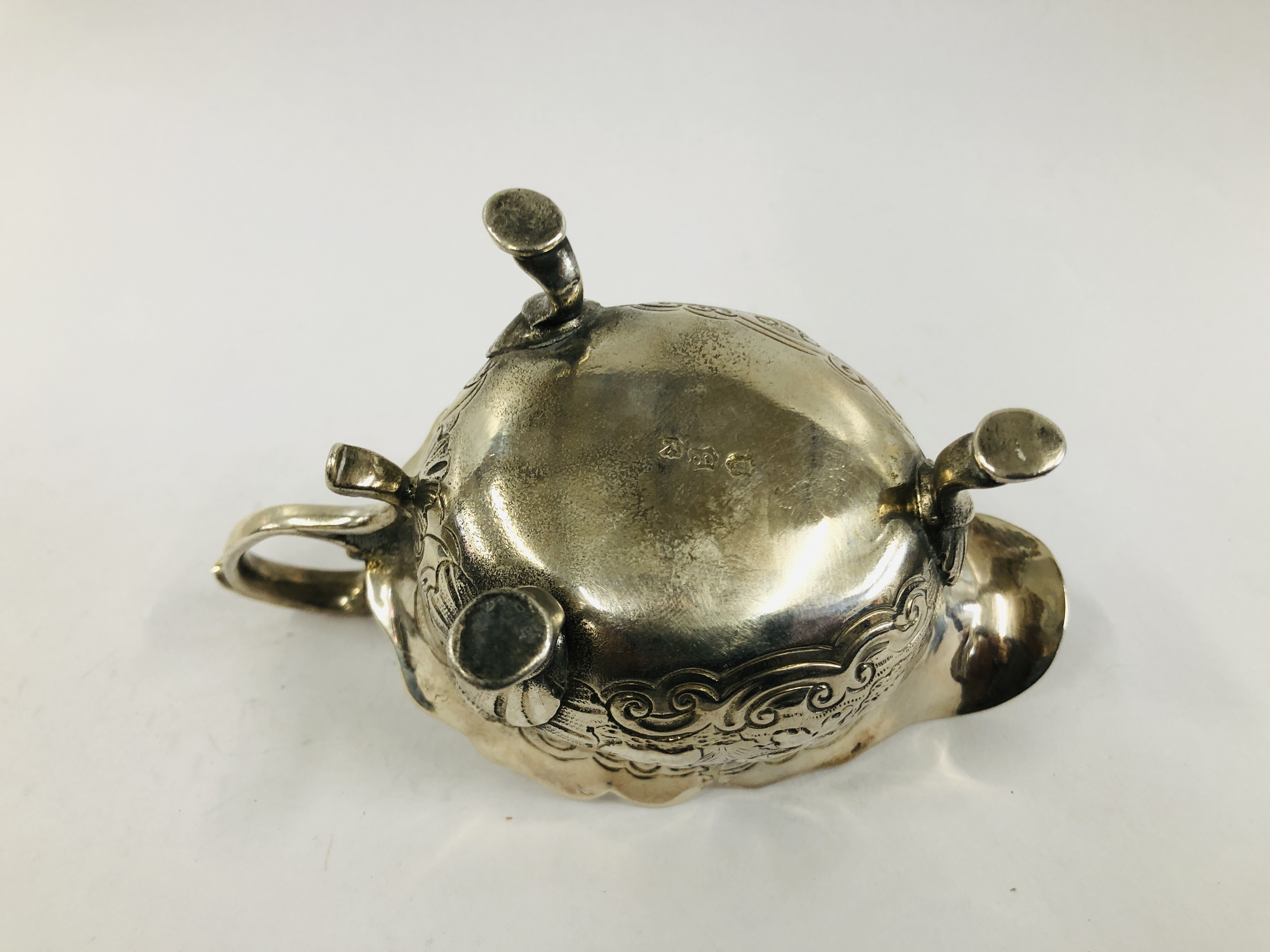 A GEORGE II SILVER CREAM BOAT WITH OPEN SCROLLED HANDLE THE BODY DECORATED WITH GEESE ON TRIPOD - Image 9 of 10