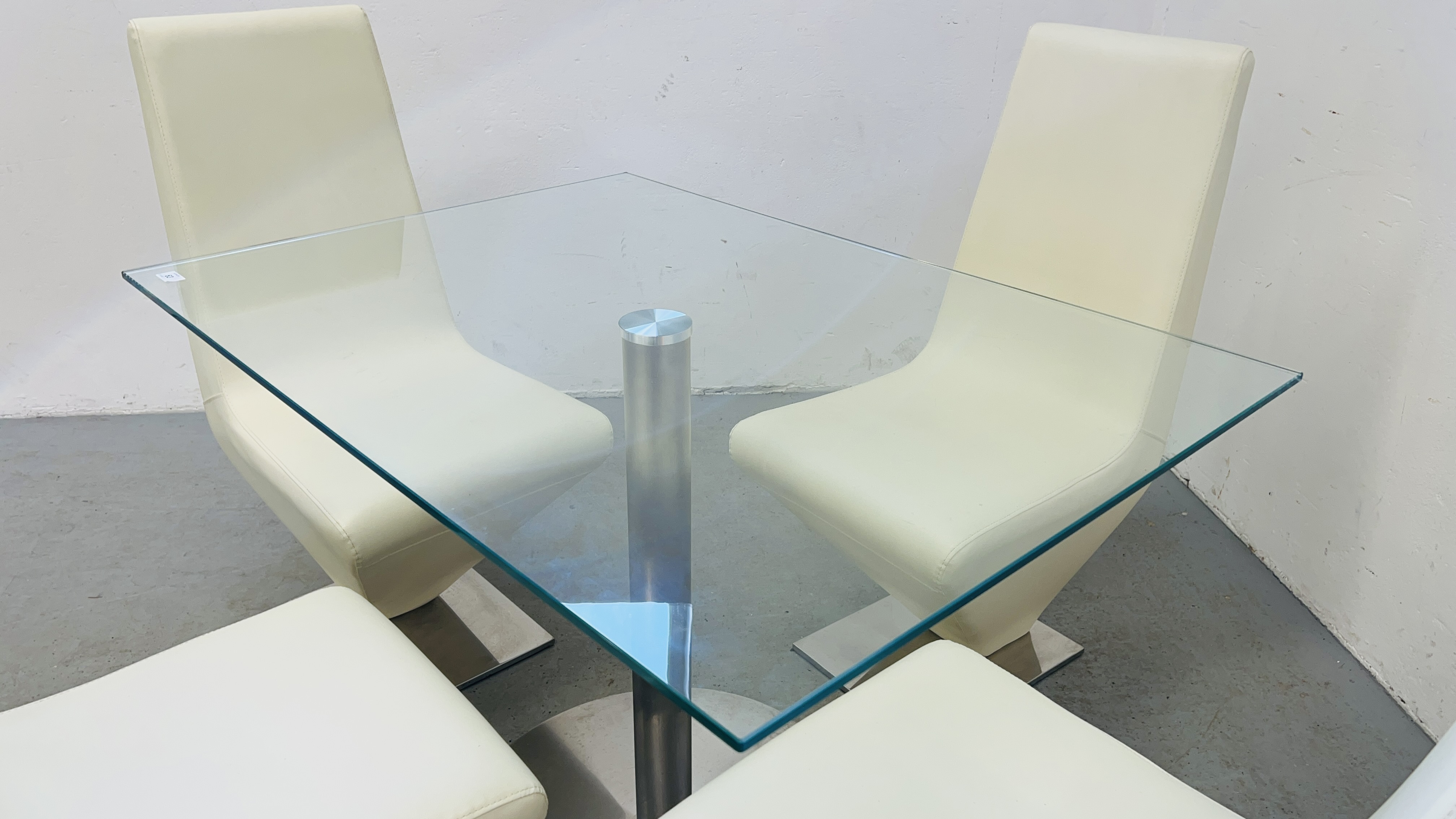 A MODERN DESIGNER GLASS TOP RECTANGULAR DINING TABLE SUPPORTED BY STAINLESS STEEL PEDESTAL COMPLETE - Image 2 of 9