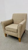 A MODERN BEIGE CHECK UPHOLSTERED EASY CHAIR