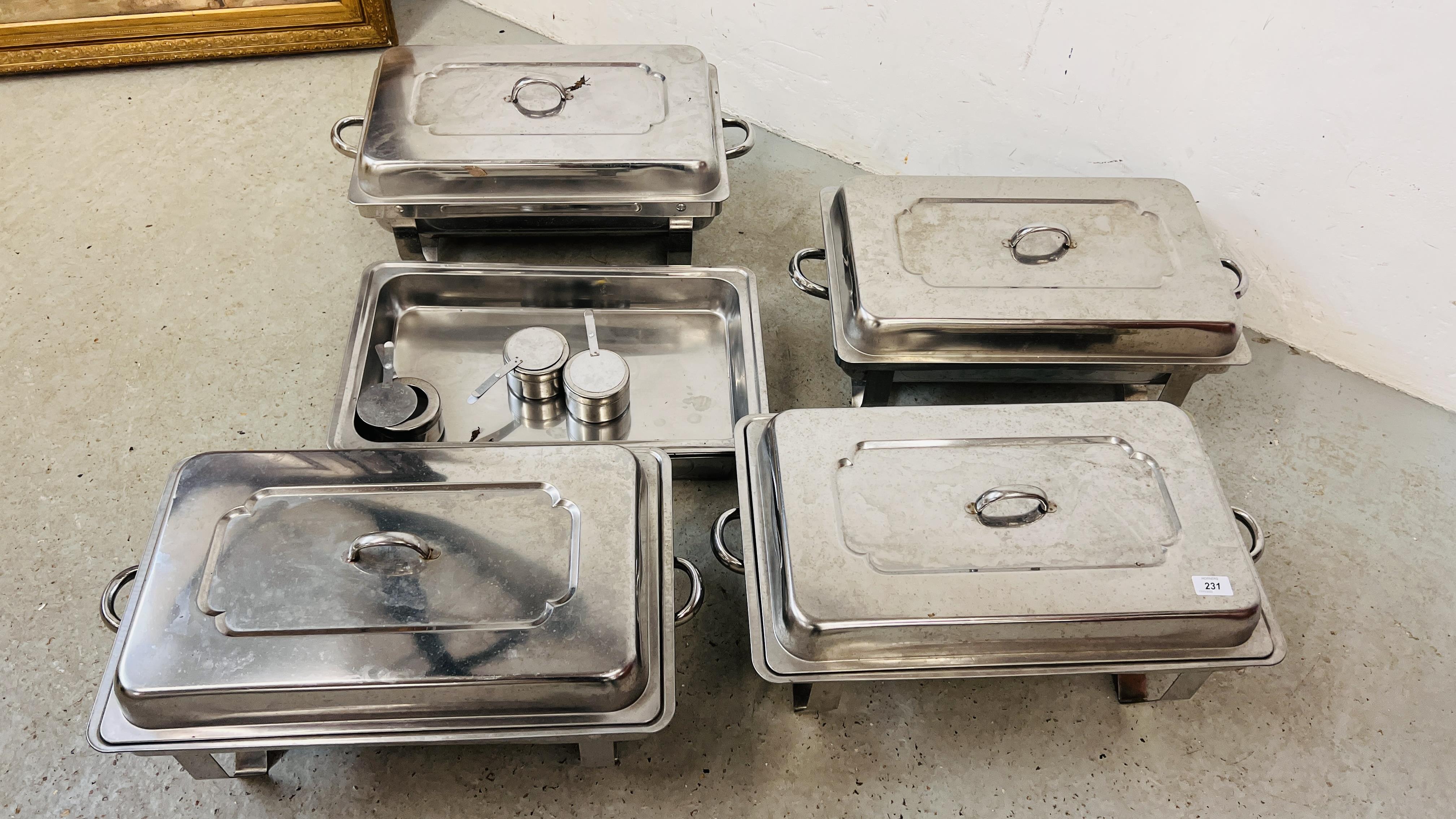 A GROUP OF FOUR STAINLESS STEEL CHAFING DISHES ALONG WITH A FURTHER FOUR TRAYS AND THREE BURNERS.