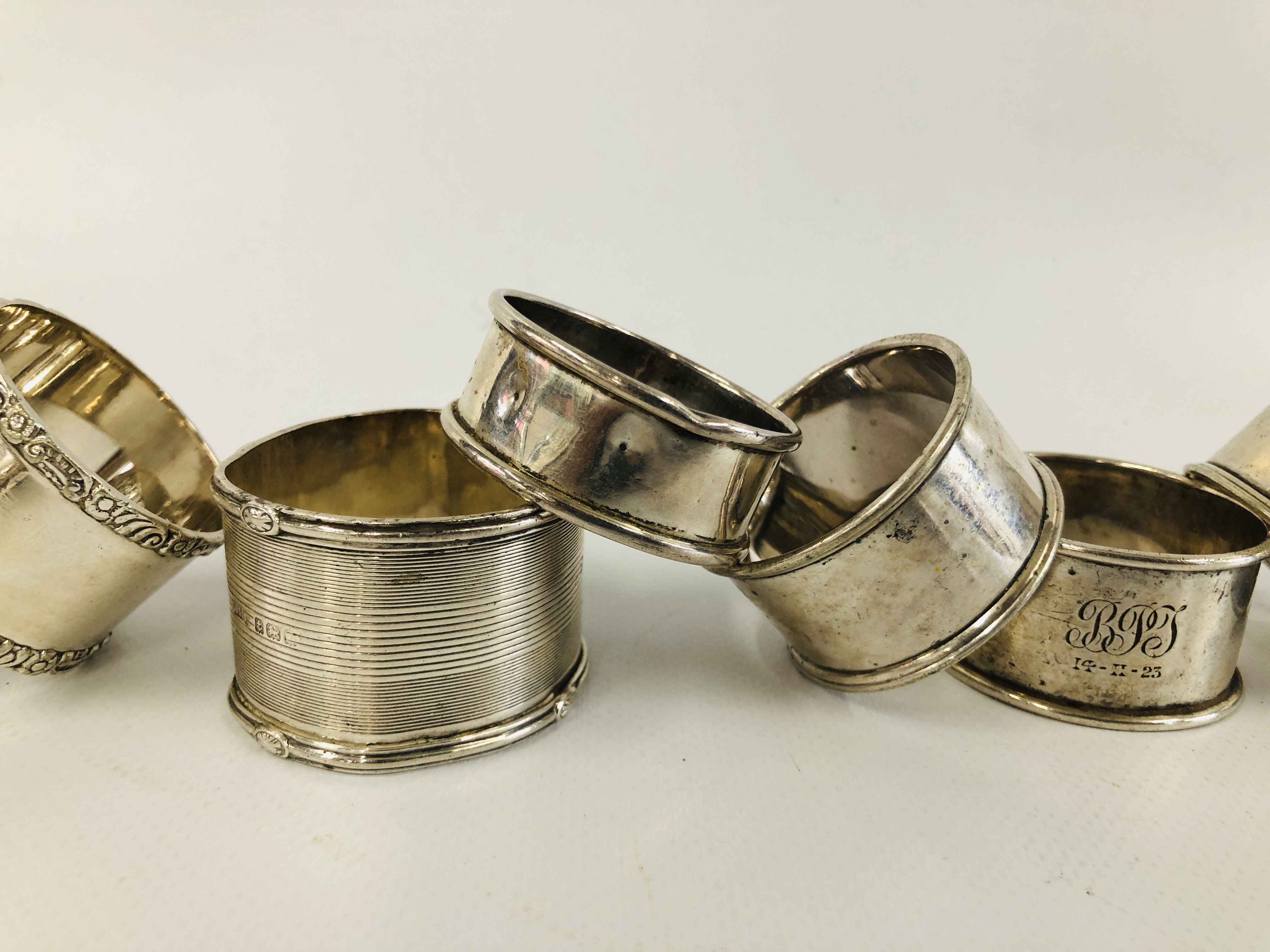 A GROUP OF FOUR SILVER NAPKIN RINGS ALONG WITH FOUR OTHERS UNMARKED - Image 3 of 9